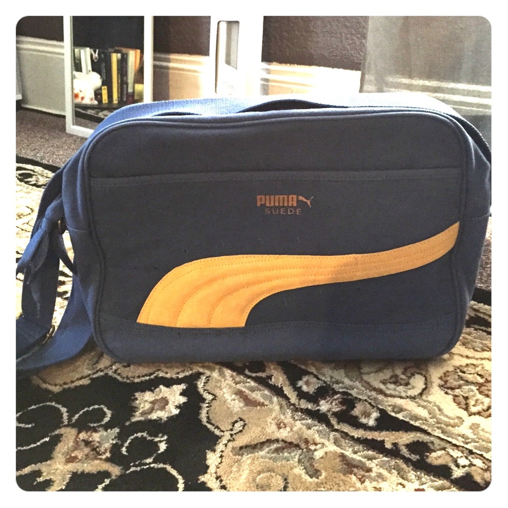 Blue and yellow puma laptop bag.